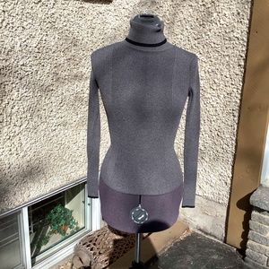 Grey size small long sleeve tight fitting sweater